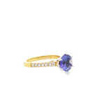 18CT YELLOW AND WHITE GOLD BRILLIANT CUT TANZANITE AND DIAMOND CLAW SET COCKTAIL RING HAND CRAFTED