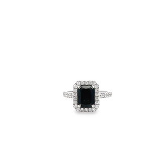 18CT WHITE GOLD CLAW SET HALO DRESS RING EMERALD CUT AUSTRALIAN SAPPHIRE AND BRILLIANT CUT DIAMONDS HAND CRAFTED 