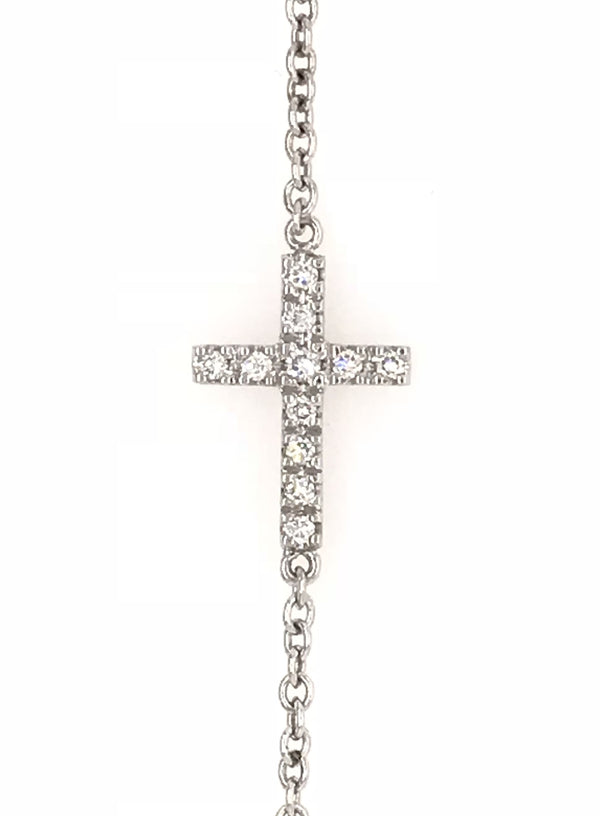 18CT WHITE GOLD FAITH BRACELET CLAW SET WITH DIAMONDS ON CROSS HAND CRAFTED