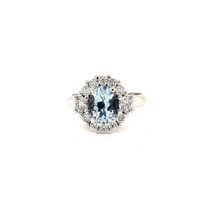 18CT WHITE GOLD HALO COCKTAIL RING CLAW SET OVAL CUT AQUAMARINE AND BRILLIANT CUT DIAMONDS HAND CRAFTED 