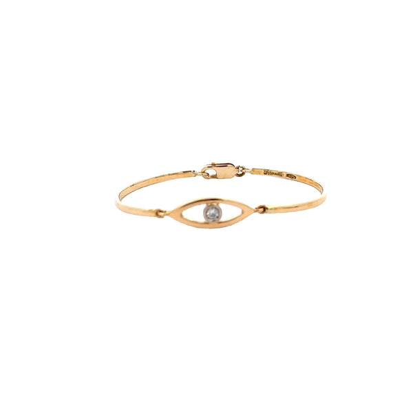 CHILD 18CT YELLOW GOLD BANGLE EYE SHAPE CENTRE FEATURING NATURAL BRILLIANT CUT DIAMOND BEZEL SET HAND CRAFTED BY CRICELLI