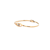 CHILD 18CT YELLOW GOLD BANGLE EYE SHAPE CENTRE FEATURING NATURAL BRILLIANT CUT DIAMOND BEZEL SET HAND CRAFTED BY CRICELLI